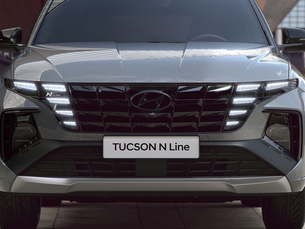 Detail of the all-new Hyundai TUCSON Plug-in Hybrid N Line front grille and headlamps.